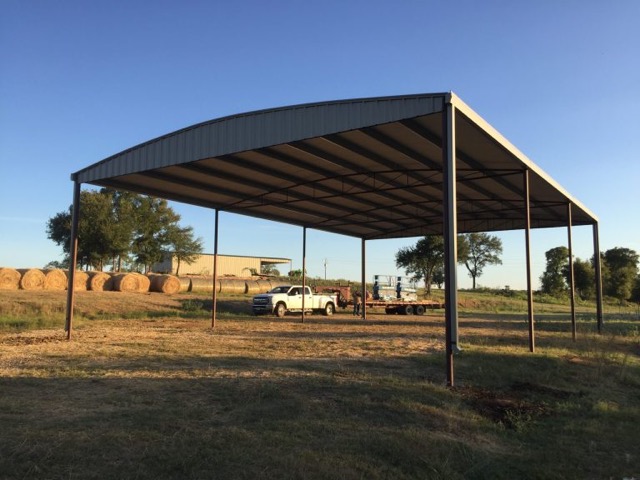 40'x60'x16' Metal Building roof only on dirt floor.